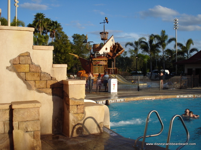Pool slide exit and kids\' play area